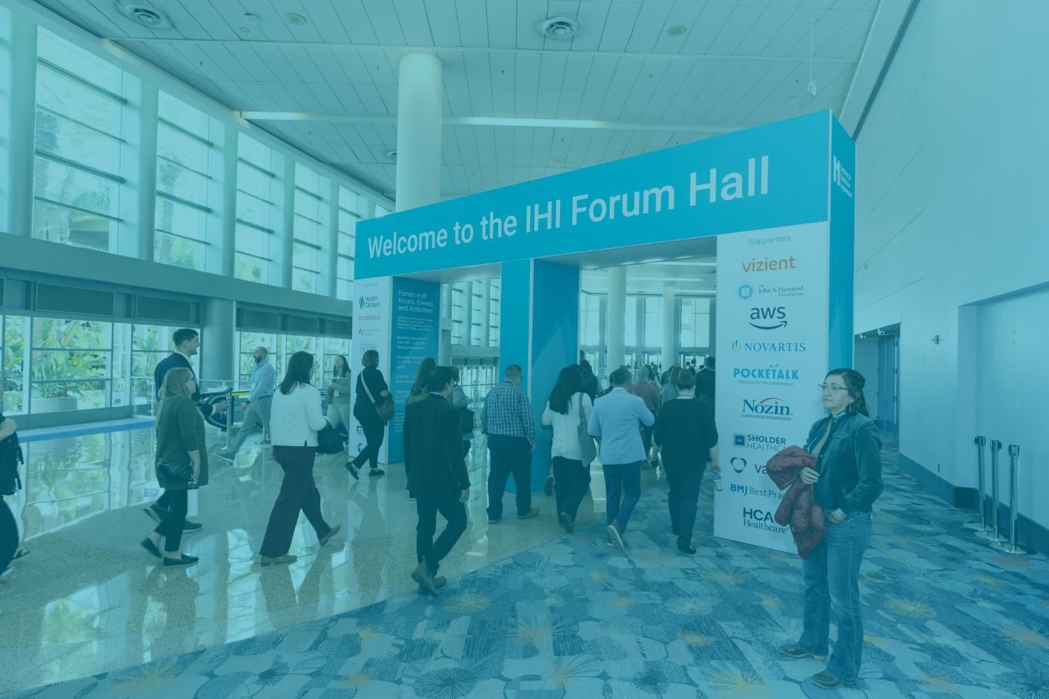 Forum 2025 Attendees Walking Into the Forum Hall