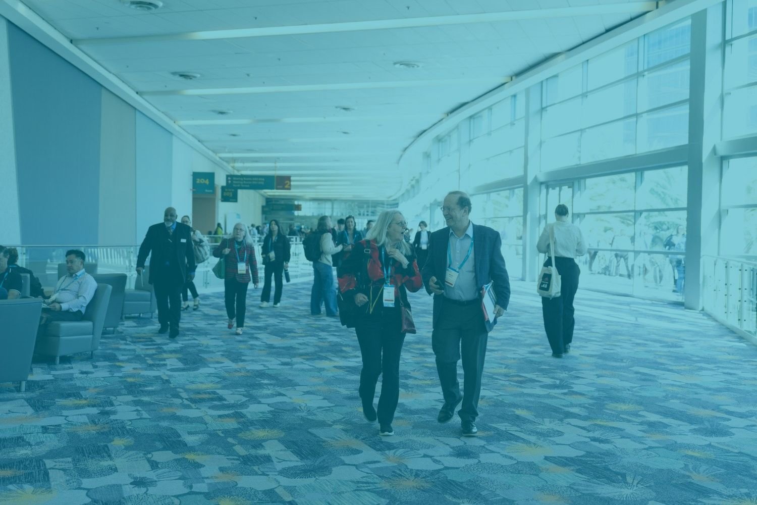 Forum 2025 Attendees Walking in Hallway